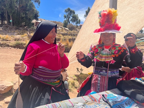 Ladies spinning yarn on Taquile Island