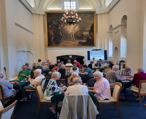 Guests playing bridge in the Marlborough Room
